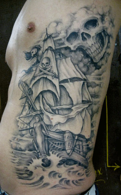 Grey Ink Ghost Pirate Ship With Skull Tattoo On Man Left Side Rib