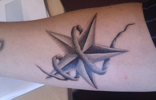 Grey Ink Nautical Star Tattoos On Arm