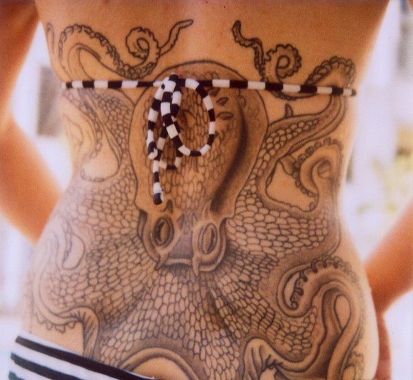 Grey Ink Octopus Tattoo On Girl Lower Back