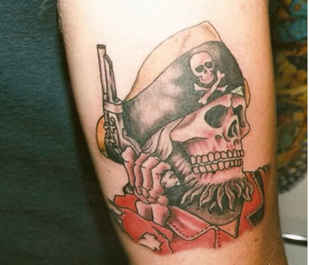 Gun In Pirate Skeleton Hand Tattoo Design For Sleeve