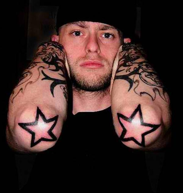 Guy Showing His Outline Star Tattoos On Both elbow