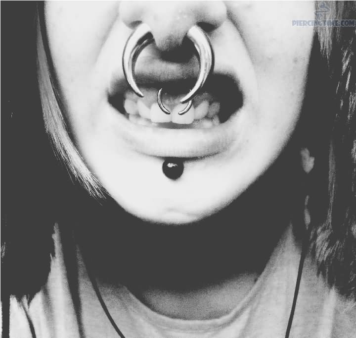 Labret, Septum And Smiley Piercing.