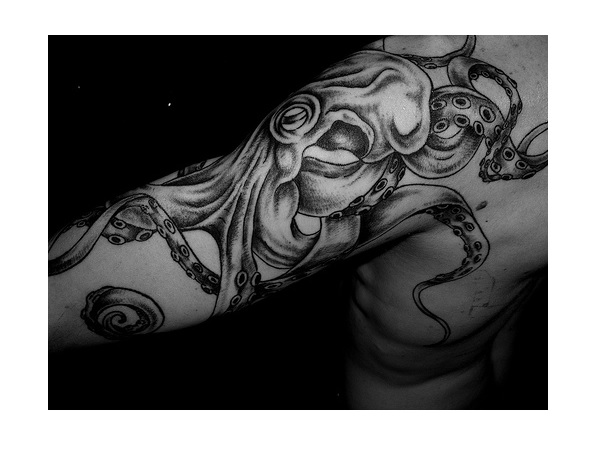 Latest Black Ink Octopus Tattoo On Man Left Half Sleeve