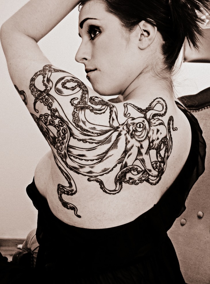 Latest Black Ink Octopus Tattoo On Women Left Back Shoulder