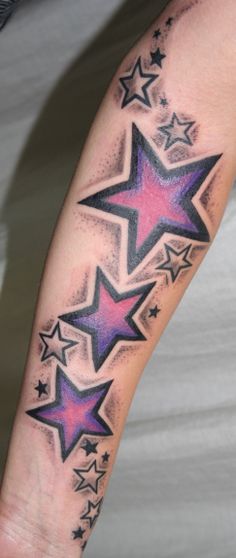 Left Forearm Colored Star Tattoos