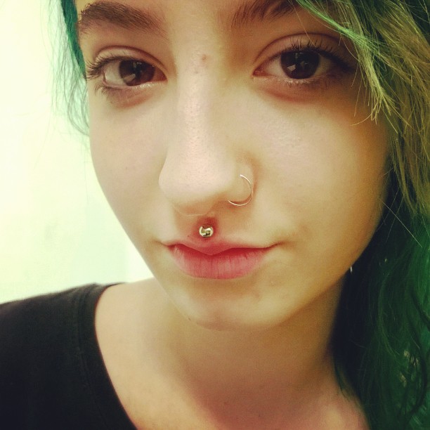 Left Nostril And Cute Medusa Piercing With Gold Stud