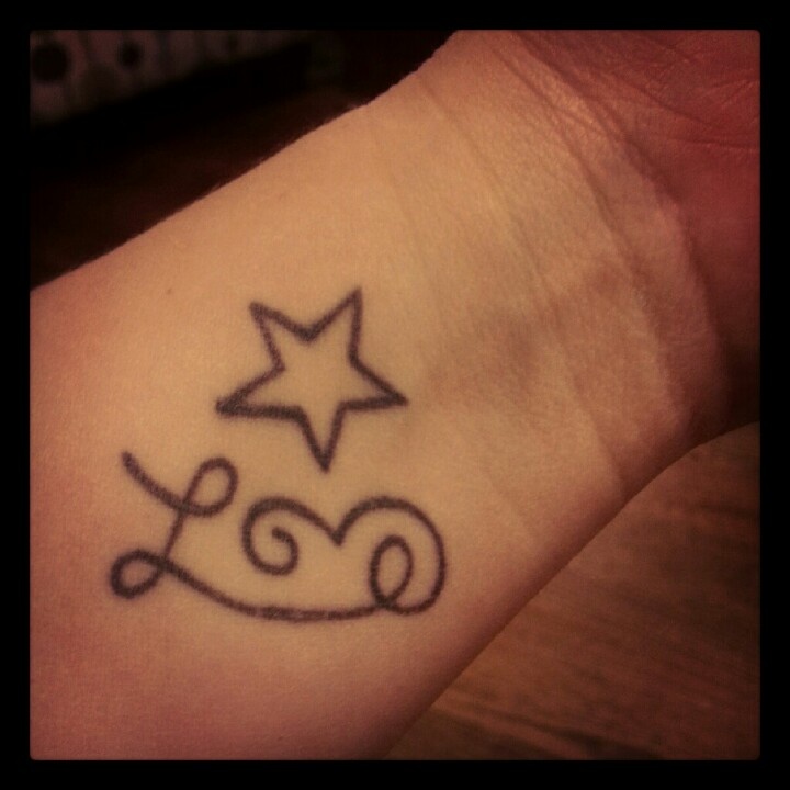 Love Star Tattoo On Left Wrist