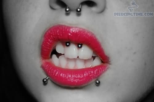 Lower Lip, Septum And Smiley Piercing
