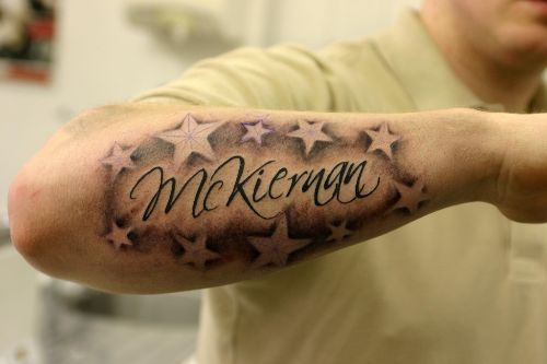 Mckieman Star Tattoos On Right Arm