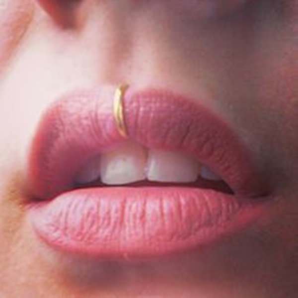 Medusa Piercing With Gold Ring