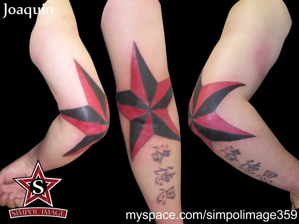 Nautical Red Star Tattoo On Elbow