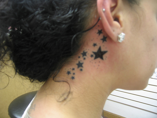 Nice Black Star Tattoos Behind Ear