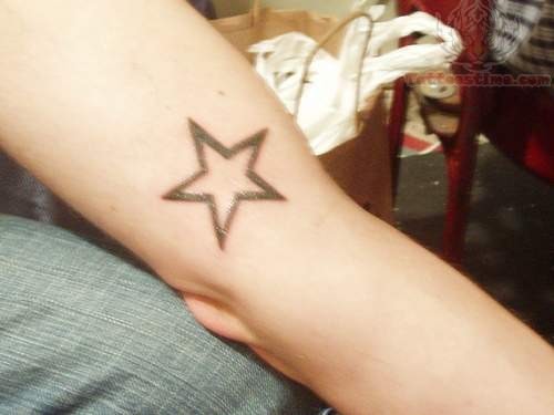 Nice Outline Black Star Tattoo On Elbow