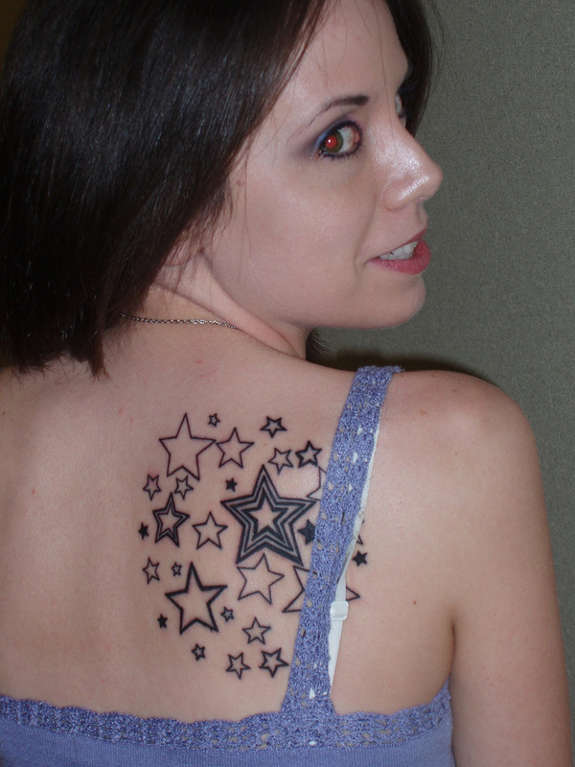 Nice Star Tattoos On Right Back Shoulder