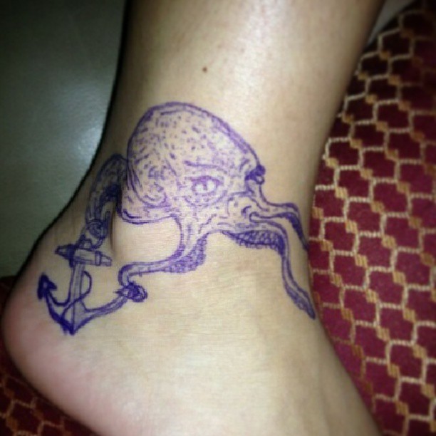 Octopus With Anchor Tattoo On Left Ankle