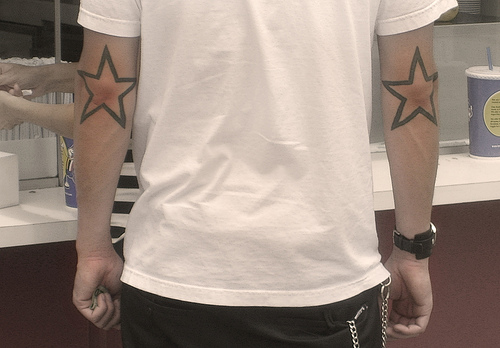 Outline Black Outline Star Tattoos On Both Elbows