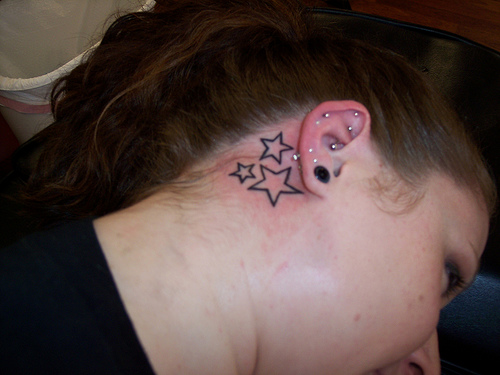 Outline Star Tattoos Behind The Ear For Girls
