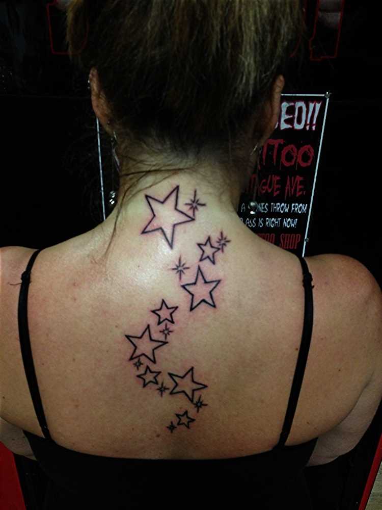 Outline Star Tattoos On Girl Upper Back