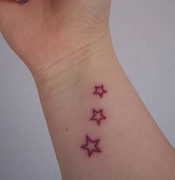 Pink Outline Star Tattoos On Wrist