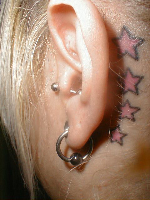 Pink Star Tattoos Behind Ear For Women