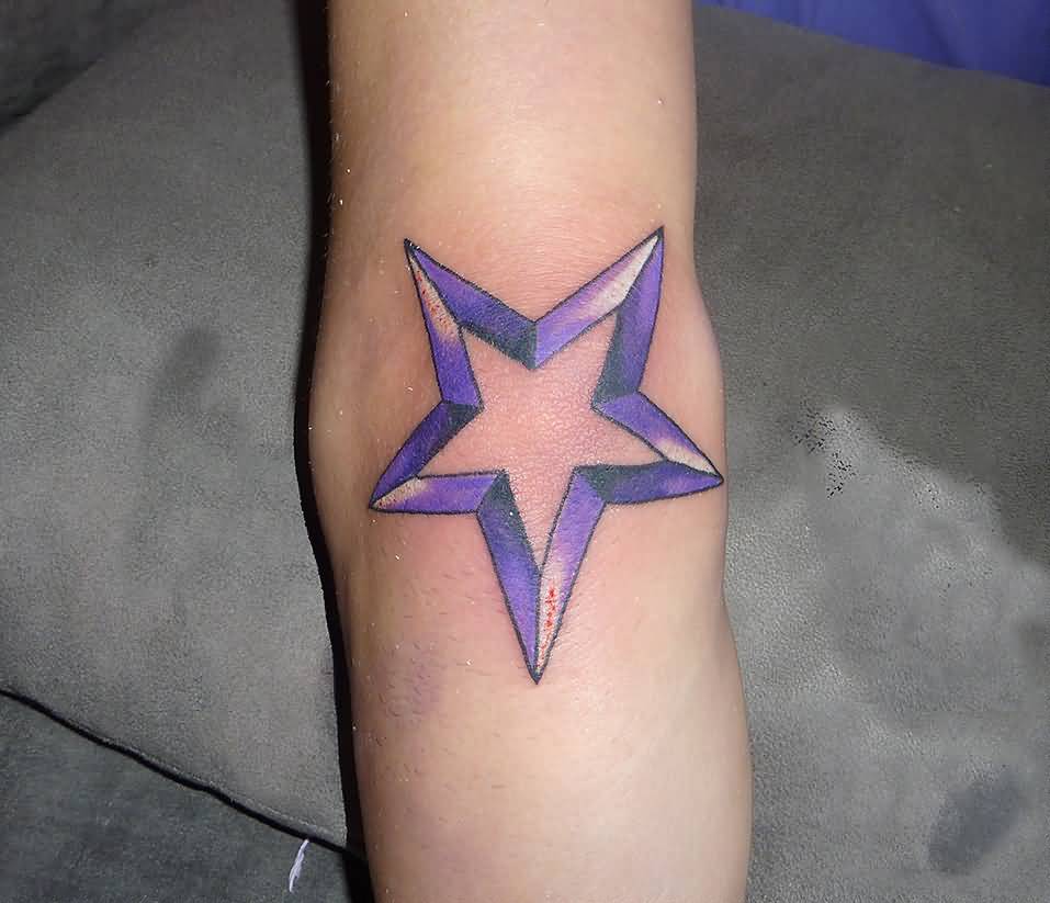 Purple Ink Star Tattoo On Elbow