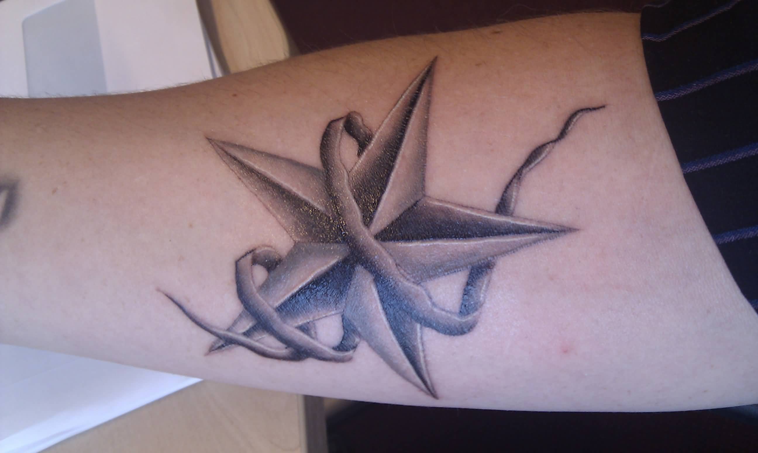 Realistic Nautical Star Elbow Tattoo
