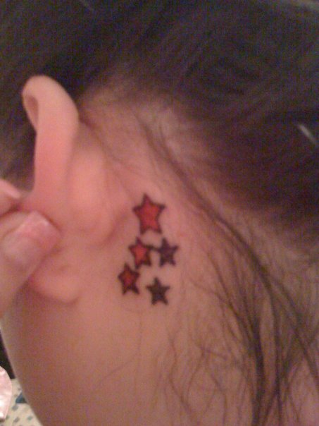 Red And Purple Star Tattoos Behind The Ear