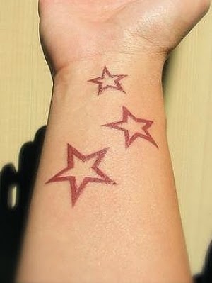 Red Outline Star Tattoos On Wrist