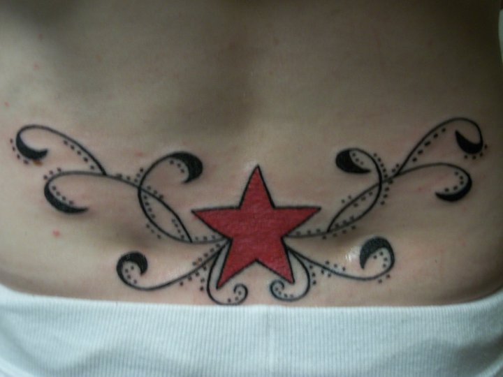 Red Star Tattoo On Lower Back