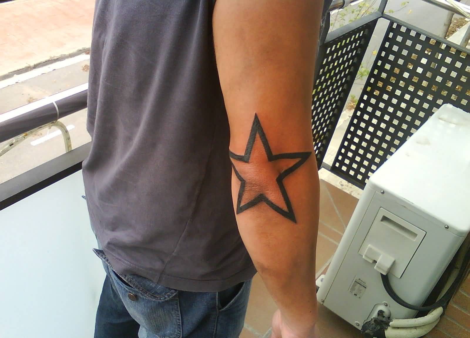 Right Arm Outline Star Tattoo On Elbow