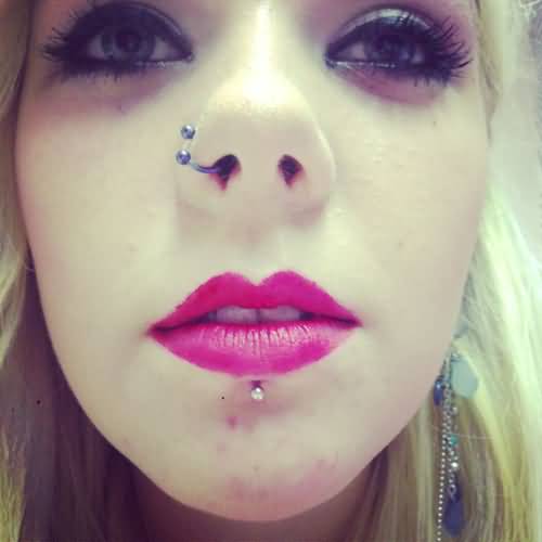 Right Nostril And Labret Piercing