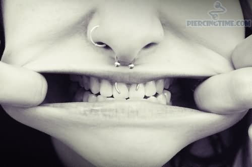 Right Nostril, Septum And Smiley Piercing