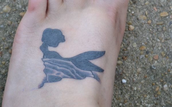 Silhouette Mermaid Tattoo On Left Foot