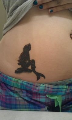 Silhouette Small Mermaid Tattoo On Girl Stomach