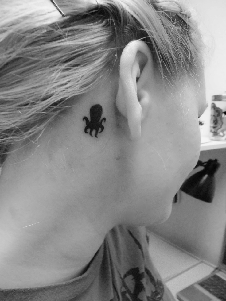 Silhouette Small Octopus Tattoo On Girl Right Behind The Ear