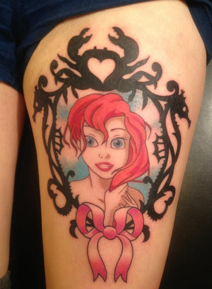 Simple Colorful Ariel Mermaid In Frame Tattoo On Left Thigh
