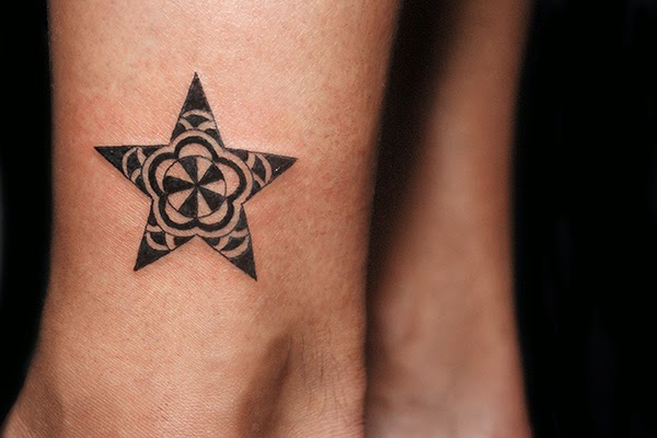 Small Black Ink Star Tattoo On Ankle