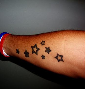 Small Black Star Tattoos On Arm