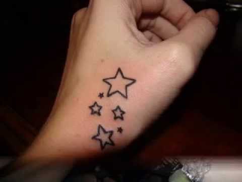 Small Outline Star Tattoos On Left Hand