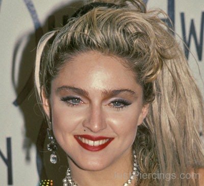 Smiling Woman With Madonna Piercing