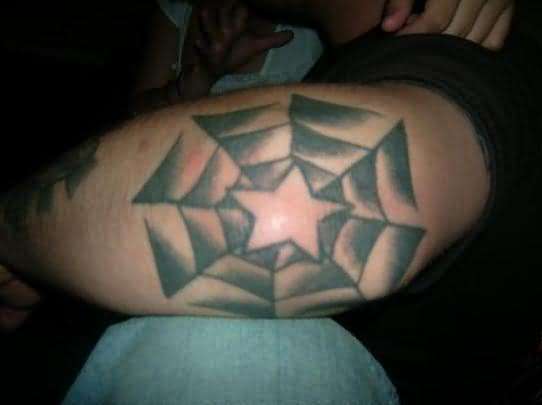 Spider Web And Star Tattoo On Left Elbow