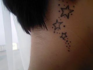 Star Tattoos On Girl Behind Ear