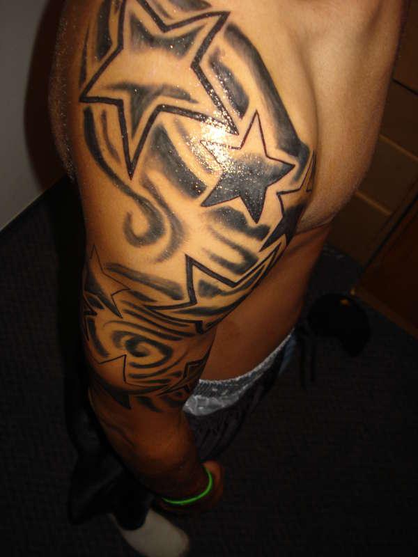 Star Tattoos On Man Right Sleeve