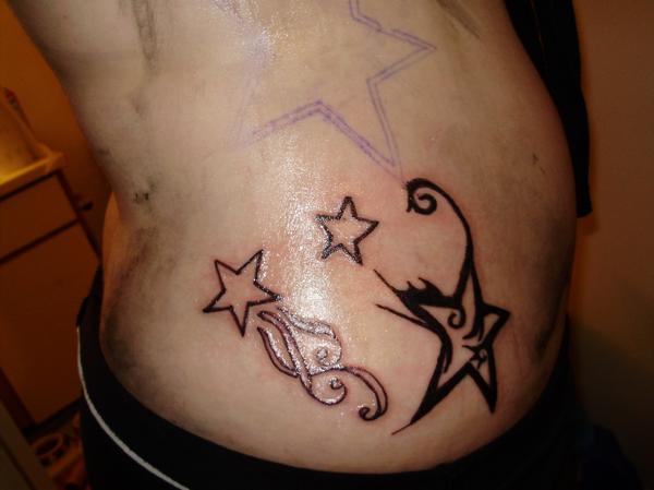 Star Tattoos On Side Rib For Men