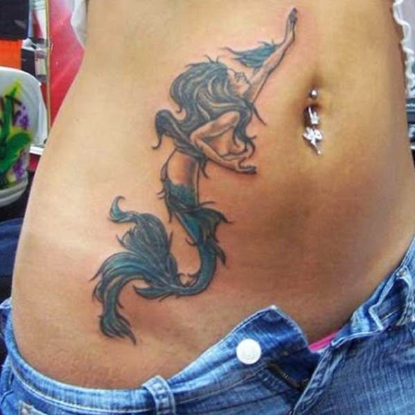 Swimming Little Mermaid Tattoo On Girl Stomach