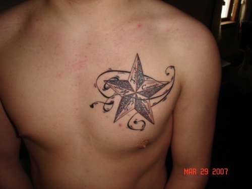 Swirl Star Tattoo On Man Chest