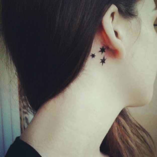 Three Black Stars Tattoo Behind Ear For Girls