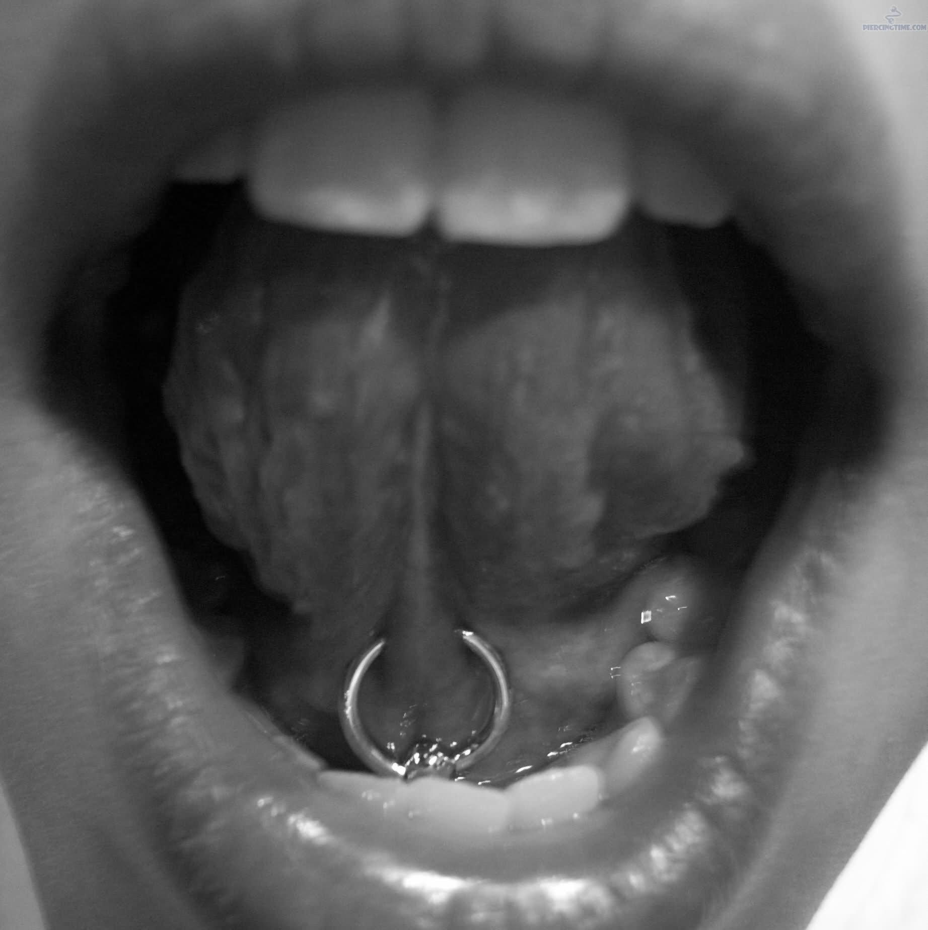 Tongue Webbing Piercing With Silver Circular Barbell