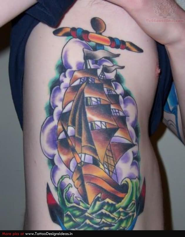 Traditional Colorful Pirate Ship Tattoo On Man Right Side Rib