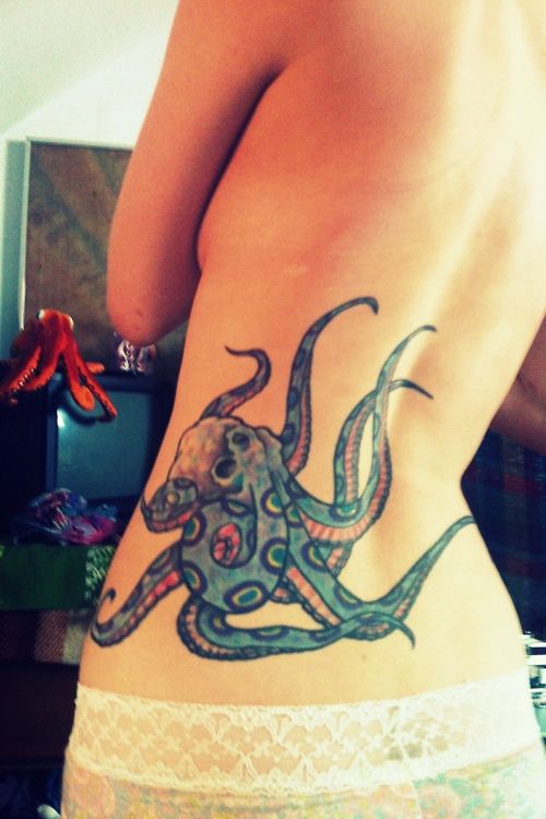 Traditional Octopus Tattoo On Girl Lower Back